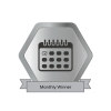 Silver badge that says 'Monthly Winner'