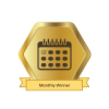 Gold M+M badge that says 'Monthly Winner'